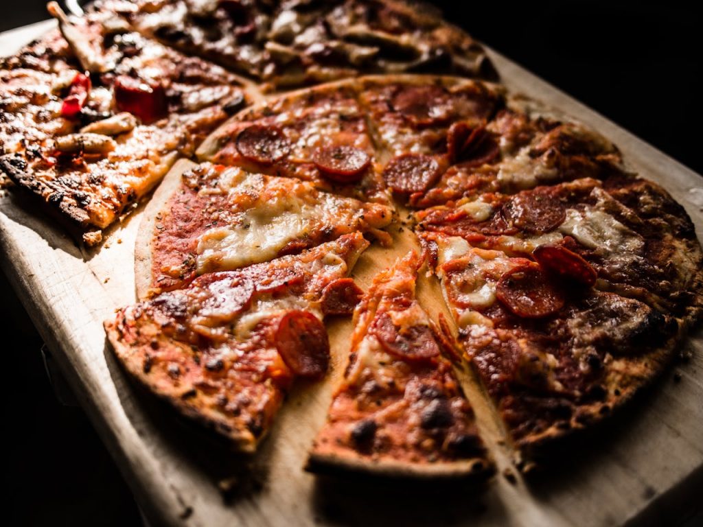pexels-photo-825661 Pizza on Brown Wooden Board